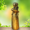 STATUETTE maman portant son fils dans les bras – Image 4